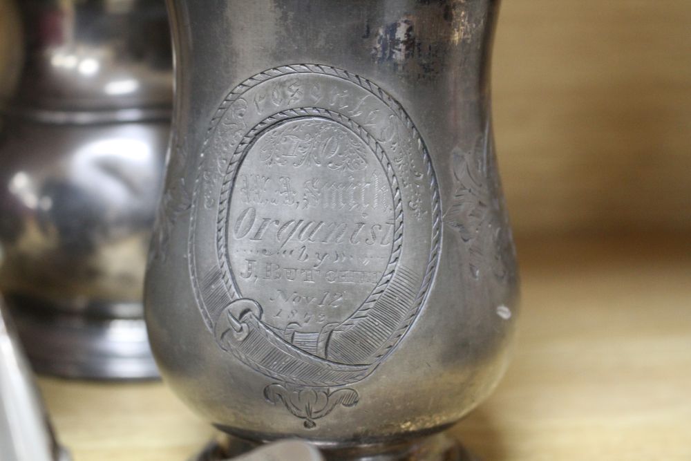 A Victorian silver plated chamberstick, pewter tankards, plates and a toast rack